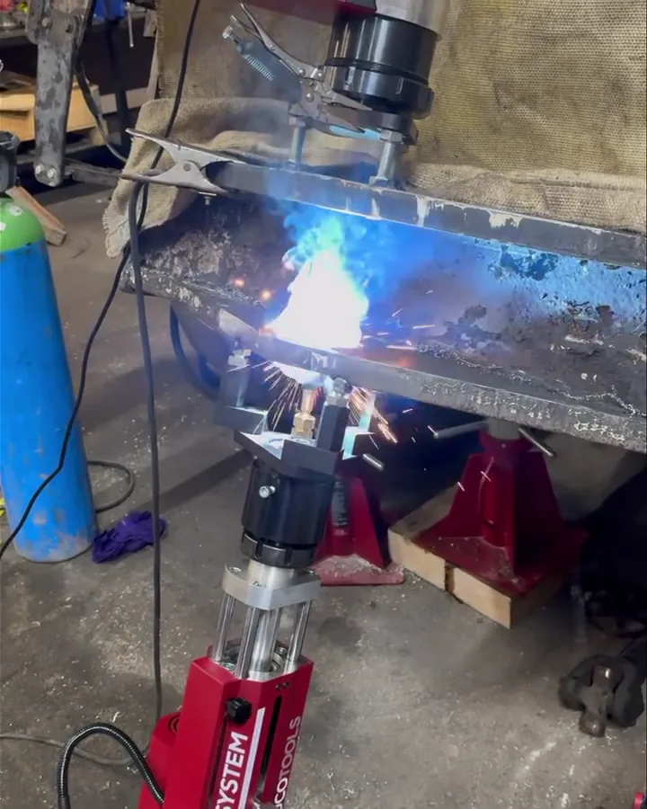 Automatic bore welding in progress.